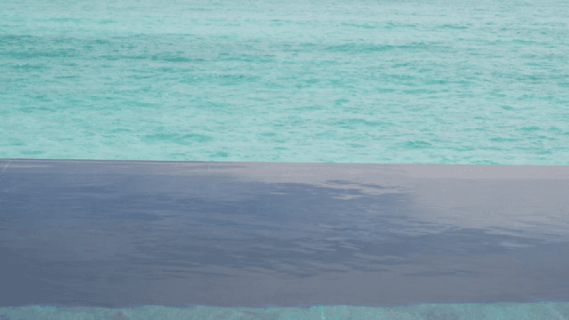 Calm ocean waves meeting the horizon
