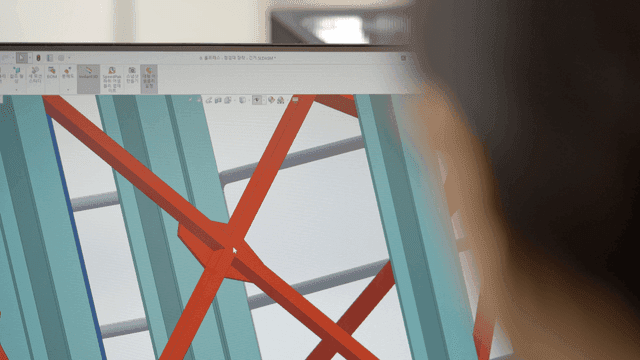 화면에 표시된 건물 구조의 3D 모델