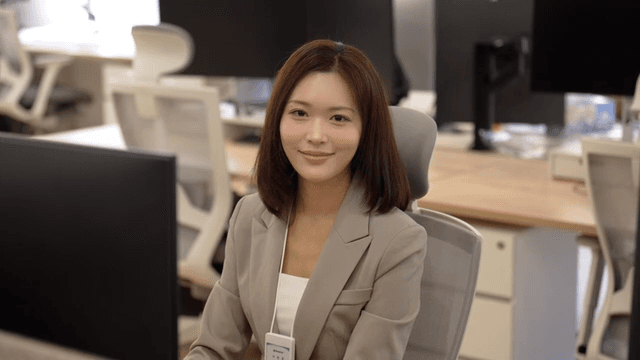 Working woman sitting at desk in office