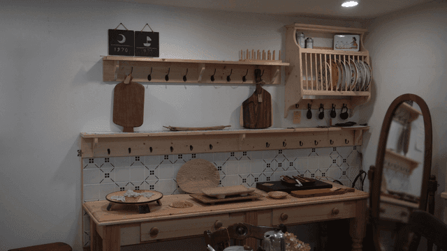 Cozy kitchen with wooden shelves