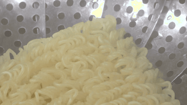 Ramen noodles placed in a stainless steamer