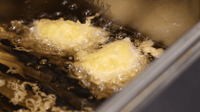 Fried cheese in hot oil