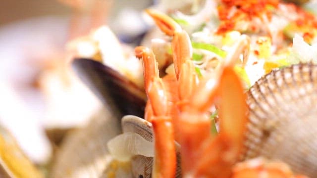 Close-up of a seafood dish with crab