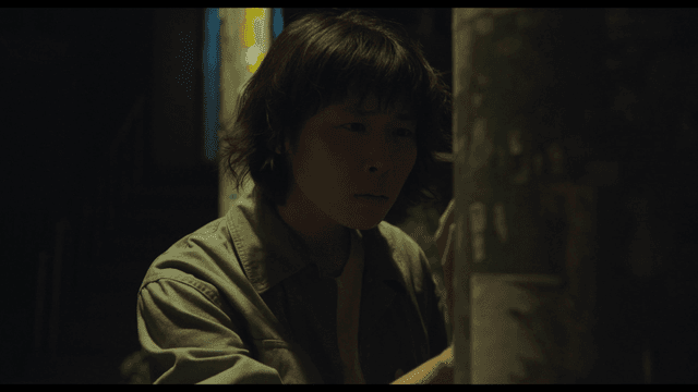 Woman surprised after discovering something on utility pole at night