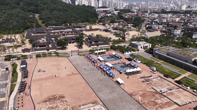 Basketball court in front of traditional Hanok