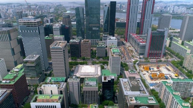 Panorama of a Riverside City Dense and Modern Buildings