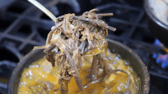 Sundae soup with bracken fern boiling in a hot pot