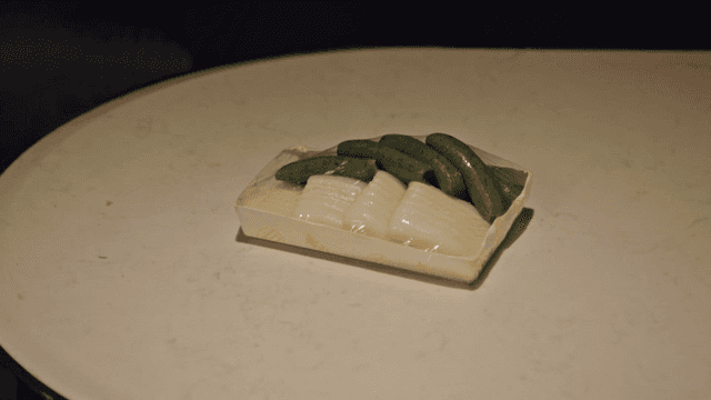 A table with Korean rice cakes and snacks