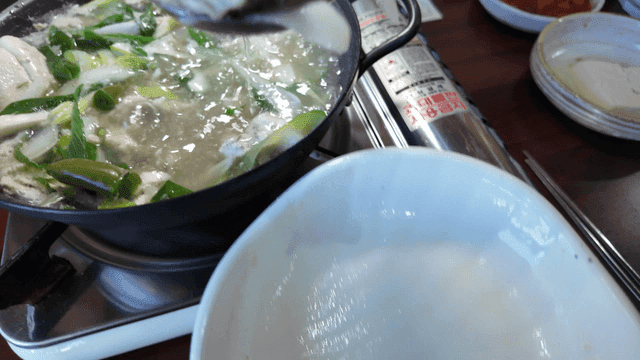 Fish soup boiling in pot