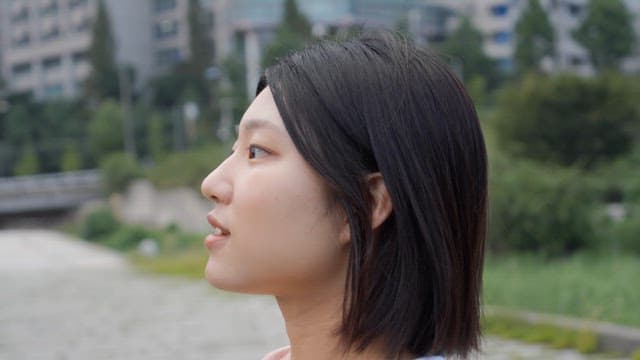 Woman smiling outdoors