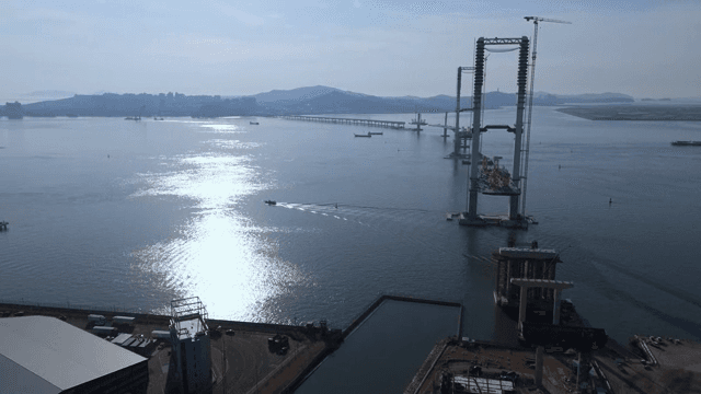Bridge construction over a calm sea
