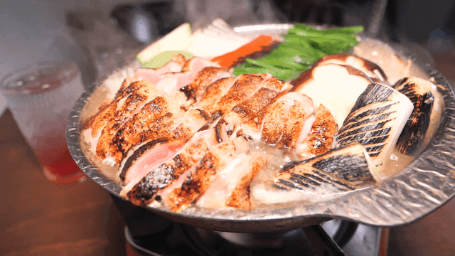Chicken stew with bubbling vegetables and mushrooms