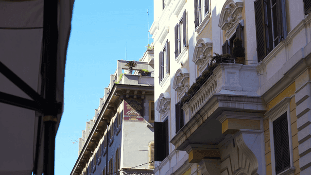 European facade with balconies and stone decorations