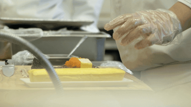 Chef preparing sushi with precision