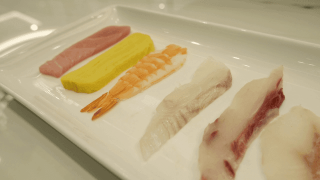 Variety of sushi pieces on a plate