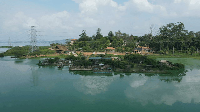 Peaceful rural village with green forests and lakes