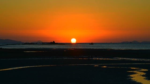 Serene Sunset Over Calm Seaside