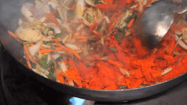 Jjamppong with stir-fried vegetables and red pepper powder