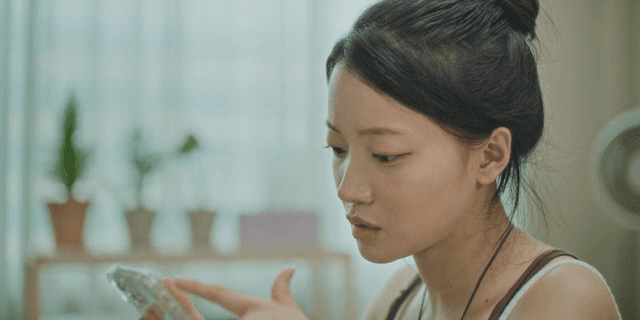 Woman using a smartphone indoors