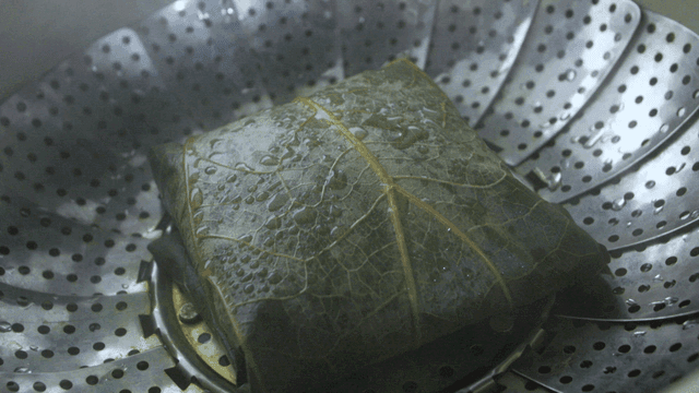 Lotus leaf rice on steaming steamer