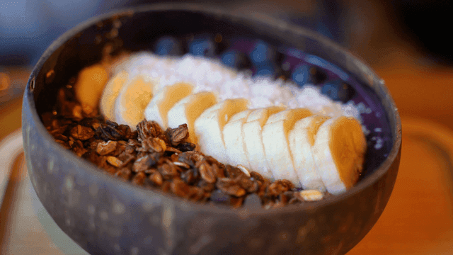 Acai bowl topped with fruit and granola