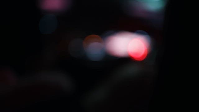 DJ Adjusting Sound Equipment for Club Atmosphere