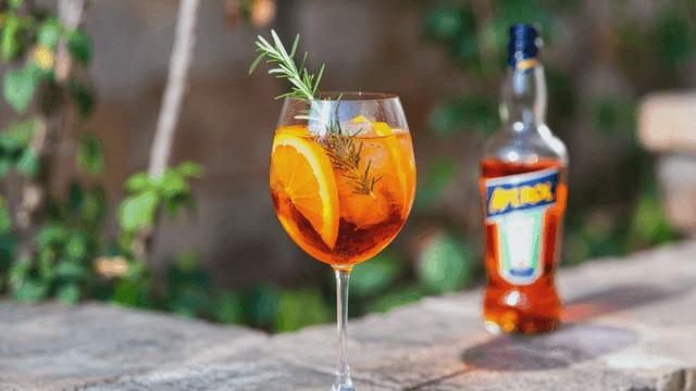 Refreshing cocktail with orange slice