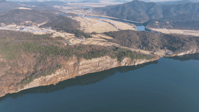 Scenic river with surrounding hills