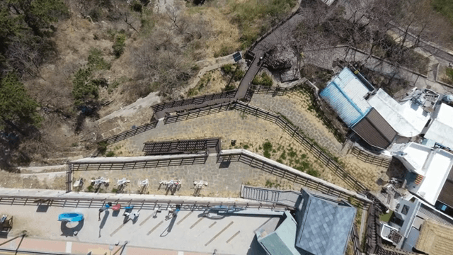 Hillside village area with pathways