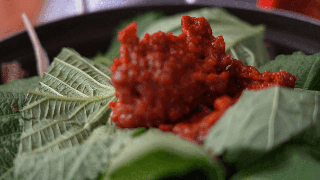 Spicy hot-pot seasoning on perilla leaf