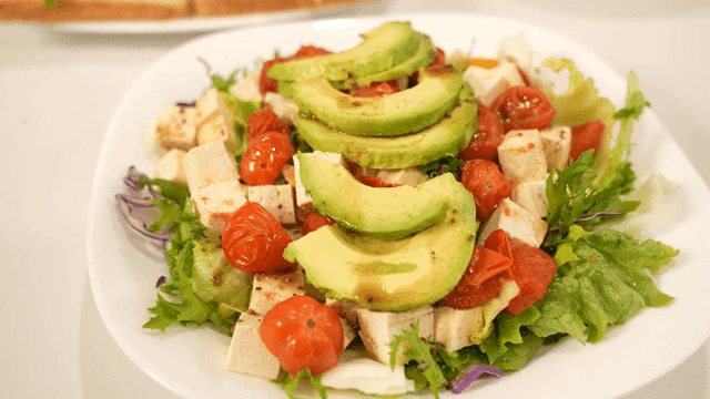 Fresh salad with avocado and tofu