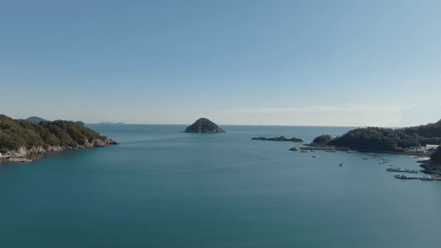 Serene coastal view with distant islands