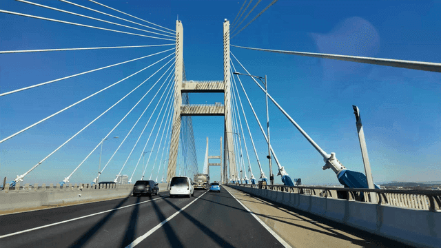 Cars driving on a large suspension bridge