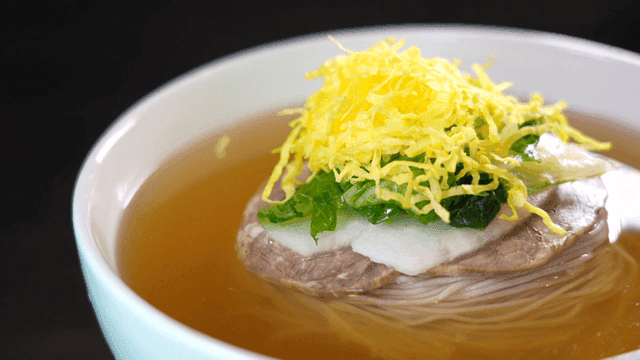 Bowl of naengmyeon with toppings