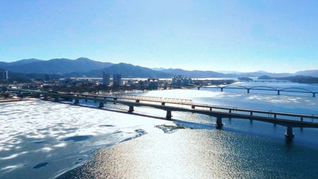 Aerial View of Cityscape with Bridges and River