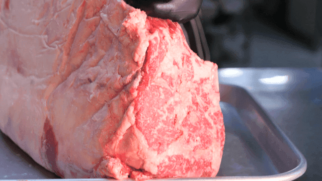 Large beef ribs at butcher shop