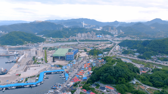 Coastal village with a large port warehouse