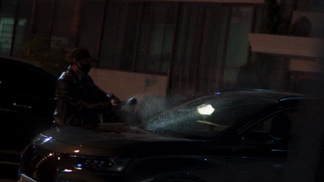 Man Hitting the Car window with a Bat at Night