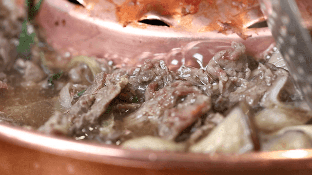 Bulgogi hot pot boiling on grill