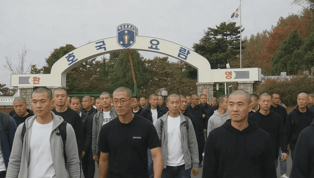 Young men entering military training camp