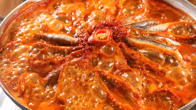 Spicy anchovy stew boiling in pot
