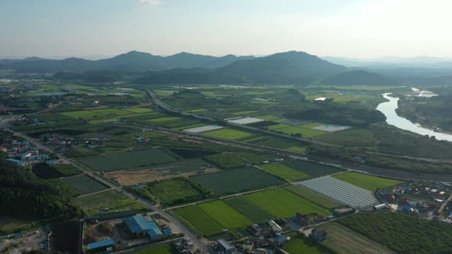 Aerial view of vast rural farmlands and villages