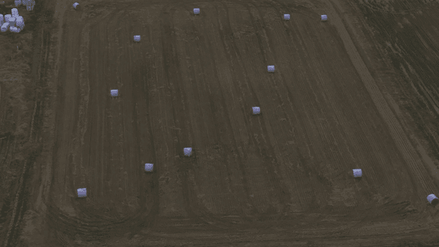 Field with haystacks