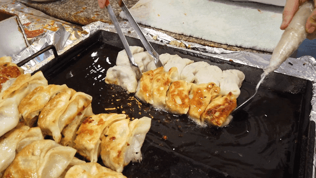 Cooking dumplings on a hot griddle
