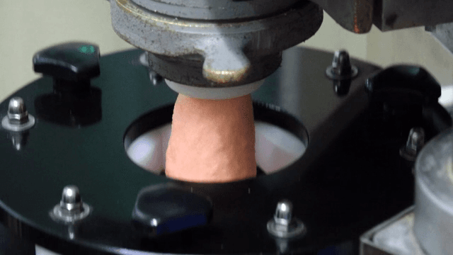 Machine processing dough in a factory