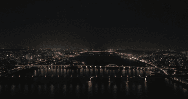 Night view of a city with illuminated bridges