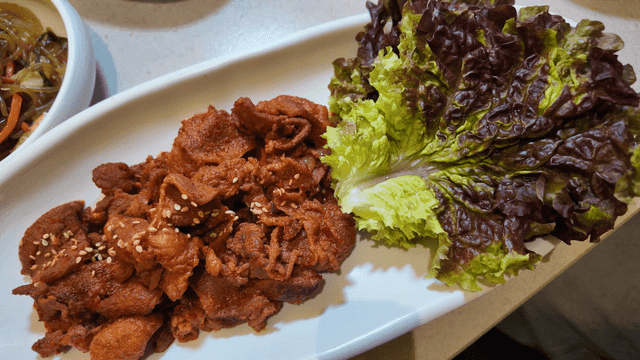 Spicy pork bulgogi with fresh lettuce