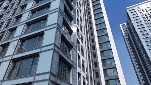 Modern skyscrapers under a clear blue sky