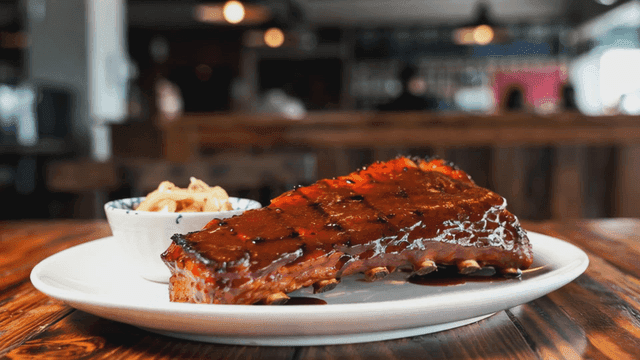 Delicious glazed pork ribs on plate