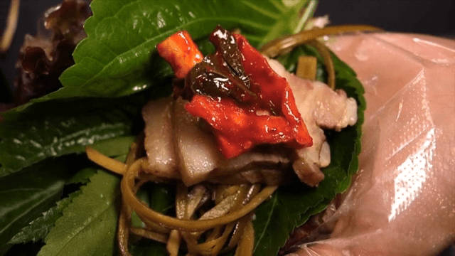Korean ssam with pork and kimchi